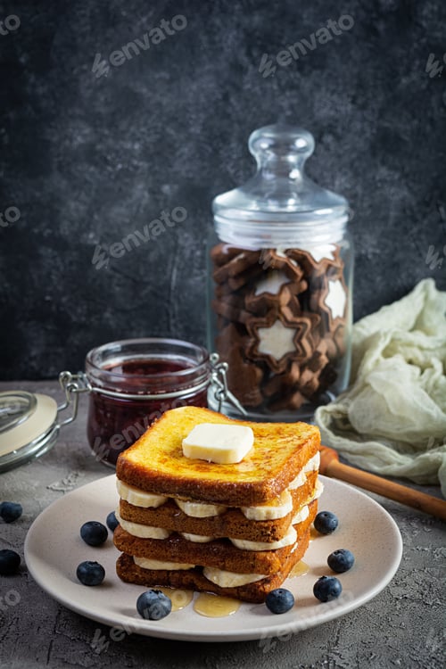 Preview: French toast with banana, blueberry, honey and strawberry jam