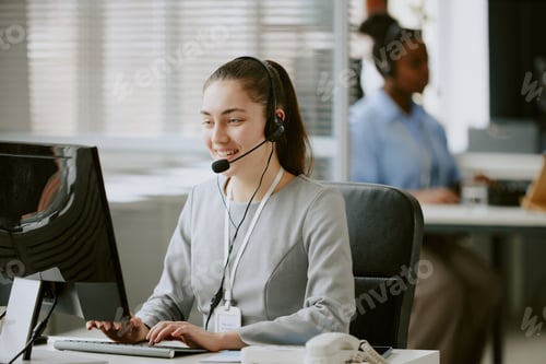 Preview: Caucasian Smiling Call Centre Operator Having Call