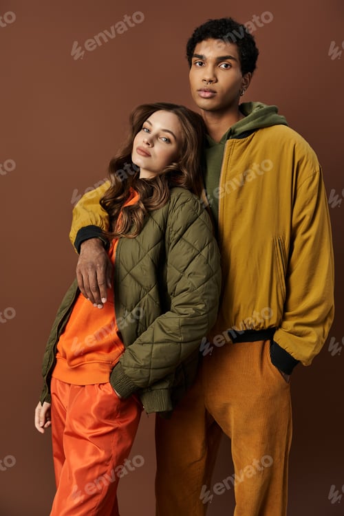 Preview: A vibrant autumn day with a stylish young couple dressed in the seasons latest fashions