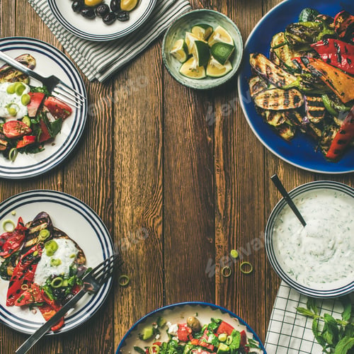 Preview: Flat-lay of healthy dinner table setting with snacks , square crop