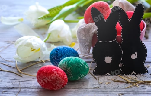 Preview: Easter still life with colored eggs and rabbit