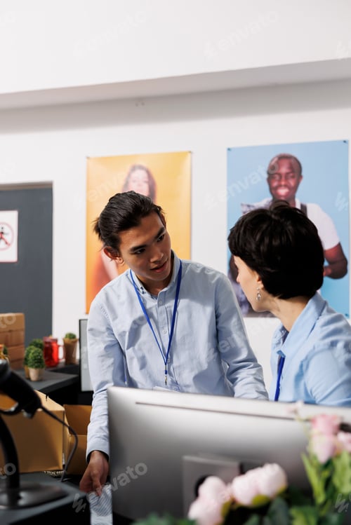 Preview: Coworkers discussing delivery report
