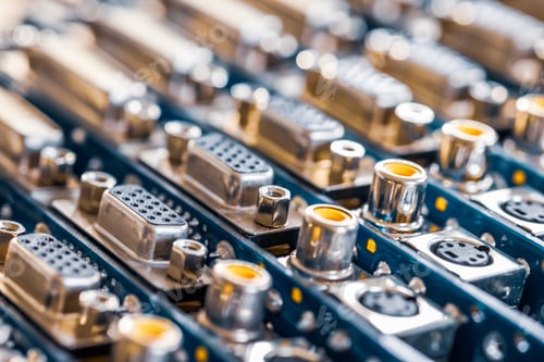 Preview: Close-up blurry metal sockets on a computer video board