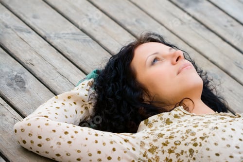 Preview: woman lying on wooden floor