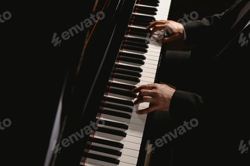 Preview: Man playing piano, above view. Talented musician