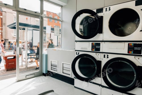 Preview: Washing machines in a laundromat
