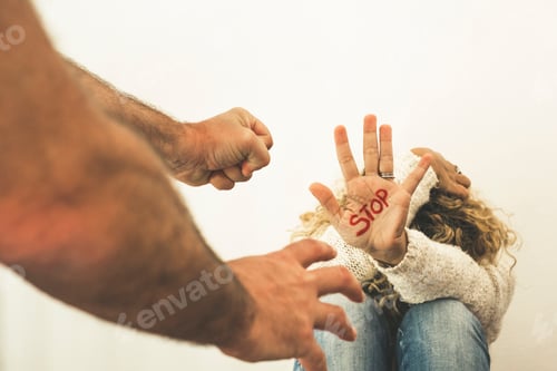 Preview: Home couple violence abuse concept with woman protect herself sitting on the floor and stop