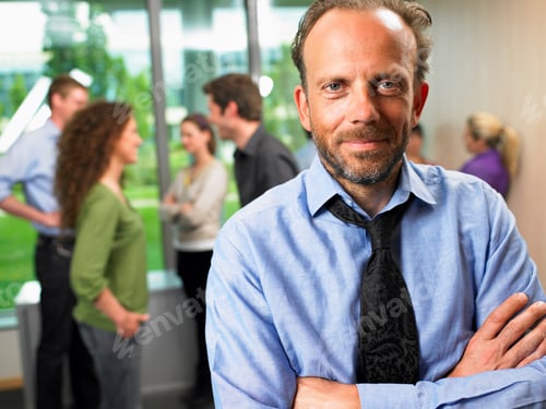 Preview: Business man in the office, smiling