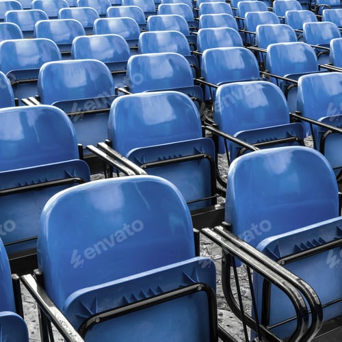 Preview: Empty plastic blue chairs