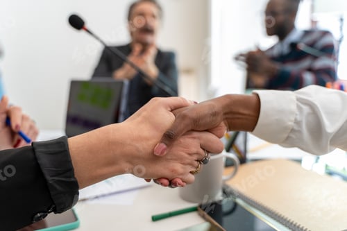 Preview: Business handshake diversity partnership conference meeting