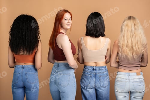 Preview: Diverse group of women posing in denim, rear view, red head woman looking at camera