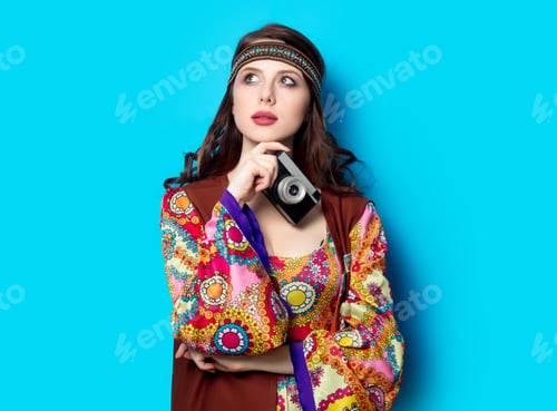 Preview: Portrait of Young hippie girl with camera