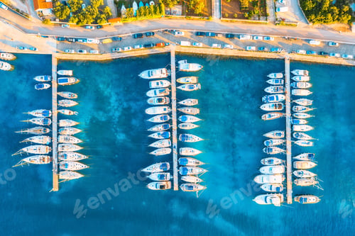 Preview: Aerial view of boats and yachts in port in old city at sunset