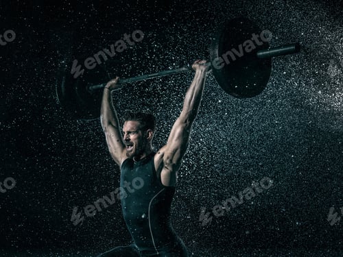 Preview: MId adult man, outdoors, lifting weights in rain