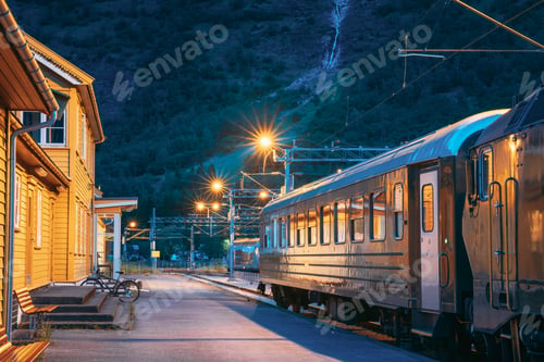 Preview: Flam, Norway. Famous Railroad Flamsbahn. Green Norwegian Train Near Railway Station. Electric