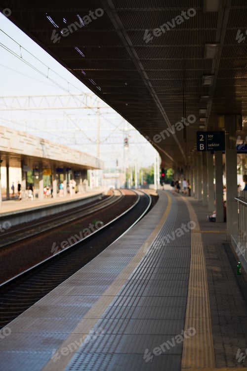 Preview: Vertical shot of the Gdansk Wrzeszcz empty railway station, view of the platform in the daylight