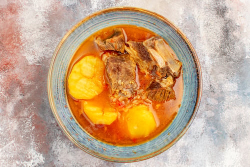 Preview: top view bozbash soup on nude background azerbaijani cuisine