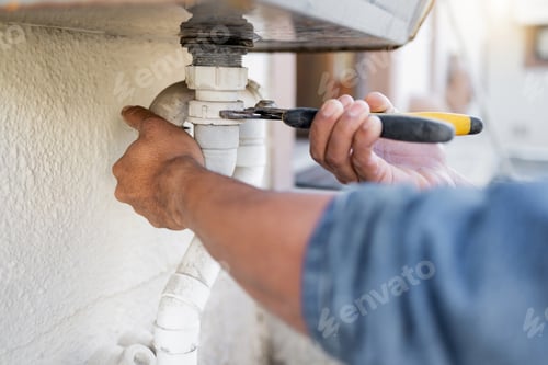 Preview: Hands, plumber and wrench for pipe, maintenance and repairs, blockage and installation by man close