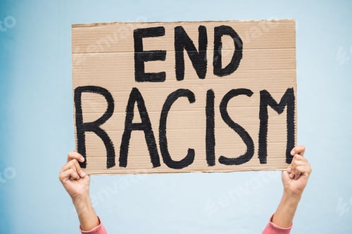 Preview: Hands, cardboard poster and end racism for protest, march or community advertisement against studio