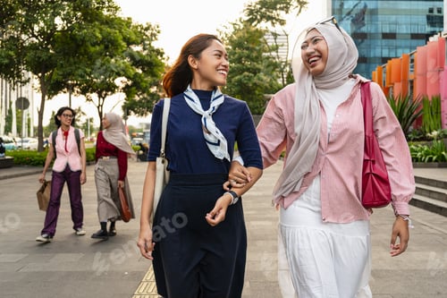 Preview: Asian women with hijab bonding and having fun outdoors