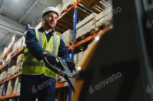 Preview: Man Driving Fork Lift Truck In Warehouse