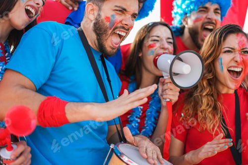 Preview: Crazy sport fans screaming while supporting their team - Focus on left man face