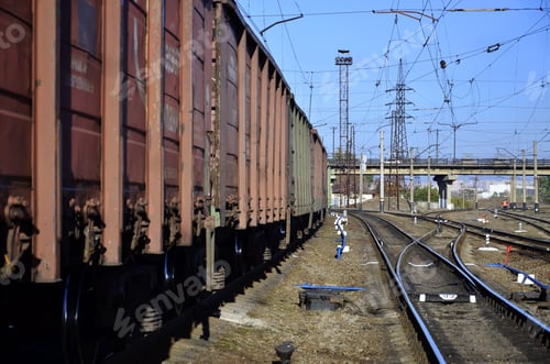 Preview: Railway landscape. Many railroad cars and tanks standing in rails