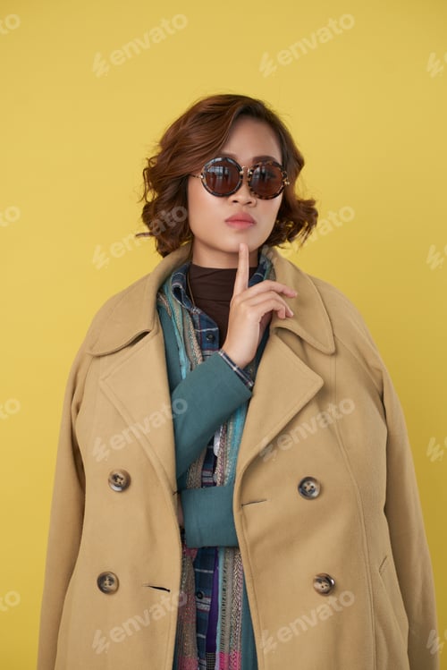 Preview: Young Woman in Warm Camel Coat