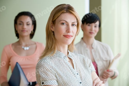 Preview: Three young women posing indoors