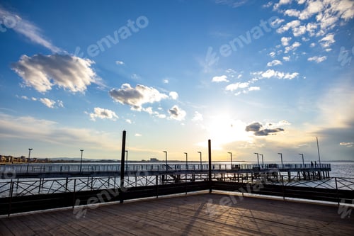 Preview: Side view of the pier on the Black Sea against the background of the sky and sunset