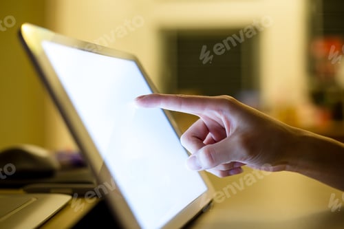 Preview: Closeup of hand sliding on digital tablet