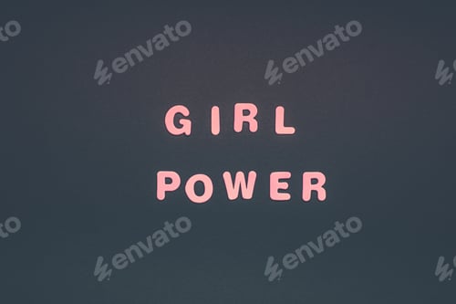 Preview: GIRL POWER writing on black paper background