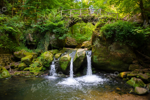 Preview: Fairytale rocky landscape with waterfall the schiessentumpel and bridge