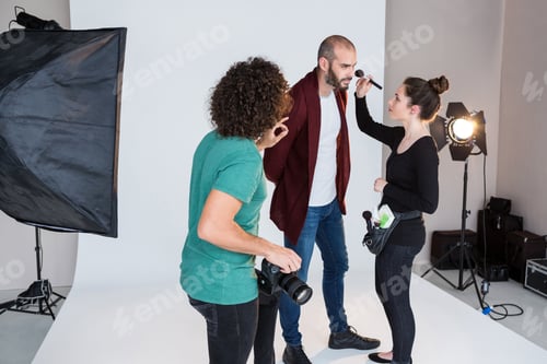 Preview: Male model preparing for a photo shoot