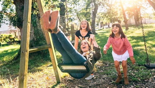 Preview: Three happy girls on a playground