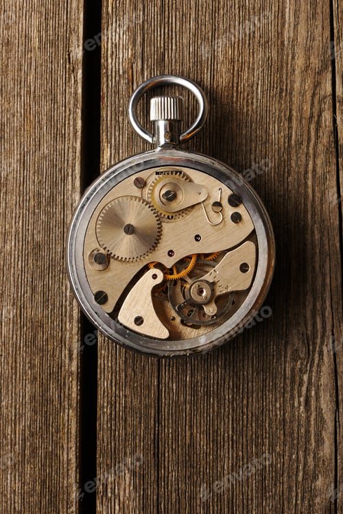 Preview: Antique Pocket Watch Mechanism on Wooden Background