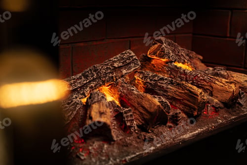 Preview: Close up of a fireplace with burning wood logs inside