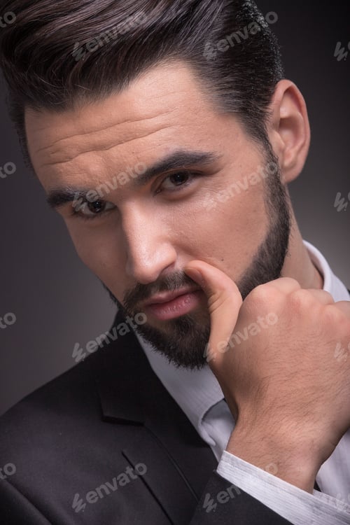 Preview: Young Man Handsome Head Face Closeup Elegant Suit, Black Background, Hand Posing