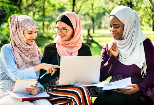 Preview: Group of islamic friends discussing and working together