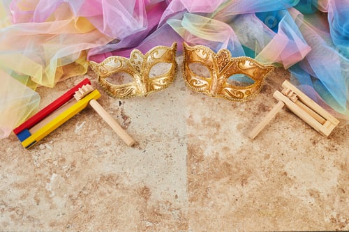 Preview: Purim celebration concept. Jewish carnival background. hamantaschen or hamans ears cookies, carnival