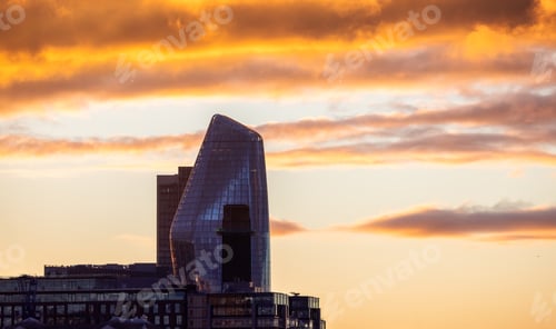 Preview: Modern Architecture Building during dramatic sunset. City of London