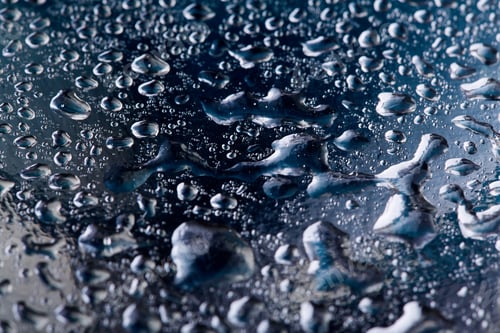 Preview: Colored Water Droplets On A Gold Background. Abstract Liquid Sprays