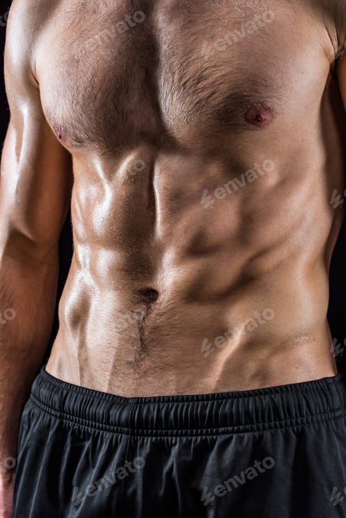 Preview: cropped view of shirtless bodybuilder posing isolated on black