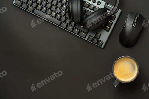Preview: Headphones, computer mouse and keyboard on black background