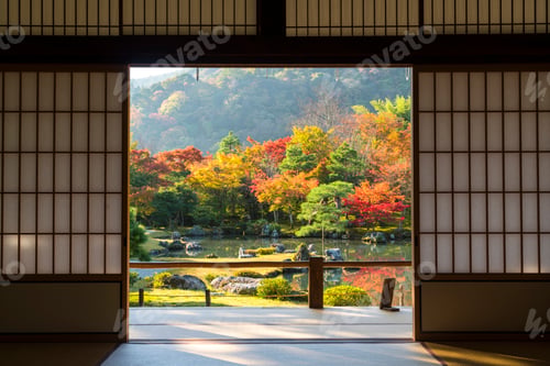 Preview: View through traditional Japanese sliding door into an autumn park landscape.