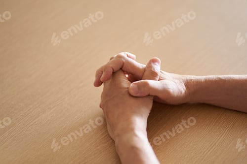 Preview: Hands of anxious elderly people