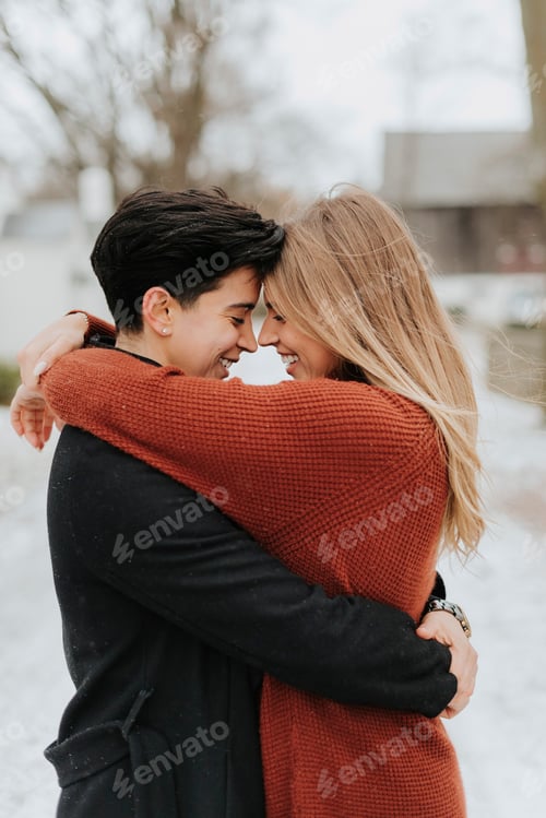 Preview: Couple hugging in snowy landscape, Georgetown, Canada