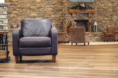 Preview: Contemporary leather armchair in a modern room.