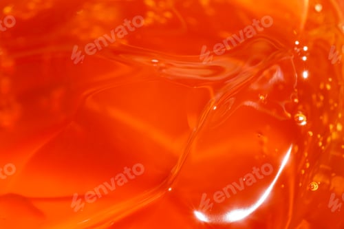 Preview: Purifying orange gel macro background texture Product for cosmetology and dermatology.