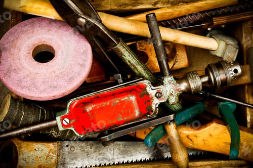 Preview: Vintage working tools on wooden background.